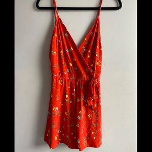Red floral wrap romper